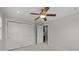 Bedroom features neutral walls, ceiling fan, carpet flooring, and a double door closet at 809 Ayrshire Ave, Fort Mill, SC 29708