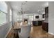 Open concept dining area, kitchen and living room is ideal for entertaining and comfortable living at 809 Ayrshire Ave, Fort Mill, SC 29708