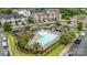 Community pool and playground area with lounge chairs, picnic tables, and manicured landscaping at 809 Ayrshire Ave, Fort Mill, SC 29708
