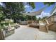 A lovely backyard includes an above-ground pool, deck, fireplace, and shaded bench seating at 842 Cherry S Rd, Rock Hill, SC 29732