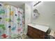 Charming bathroom featuring a fun shower curtain and a vanity with storage at 842 Cherry S Rd, Rock Hill, SC 29732