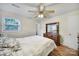 Bedroom with wooden floors featuring a dresser and bright window at 842 Cherry S Rd, Rock Hill, SC 29732