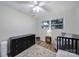 Bright bedroom with a ceiling fan, a large window, and modern furnishings, providing a tranquil and comfortable retreat at 842 Cherry S Rd, Rock Hill, SC 29732