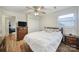 Comfortable bedroom featuring a wood dresser, spacious closet, and window at 842 Cherry S Rd, Rock Hill, SC 29732