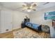 Bright bedroom featuring a ceiling fan, hardwood floors, and comfortable furnishings, creating a serene and inviting atmosphere at 842 Cherry S Rd, Rock Hill, SC 29732