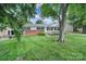 A lovely home with a vibrant green lawn and a cozy front porch swing, perfect for relaxing outdoors at 842 Cherry S Rd, Rock Hill, SC 29732