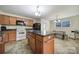 Kitchen with a center island, wooden cabinets and an eat in dining area at 842 Cherry S Rd, Rock Hill, SC 29732