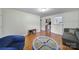 Cozy living room with hardwood floors, plush seating, and seamless transition to the kitchen, perfect for entertaining at 842 Cherry S Rd, Rock Hill, SC 29732