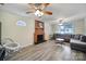 Cozy living room with hardwood floors, brick fireplace, and neutral decor, perfect for comfortable living at 842 Cherry S Rd, Rock Hill, SC 29732
