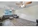 Spacious living room with neutral paint, large windows, and laminate flooring at 842 Cherry S Rd, Rock Hill, SC 29732