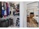 Walk-in closet with shelving leading to an ensuite bedroom and bathroom at 842 Cherry S Rd, Rock Hill, SC 29732