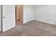 Neutral bedroom with a closet and a door leading to another room at 871 Academy St, Charlotte, NC 28205