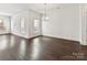 Open living area with hardwood floors and bright, natural light at 871 Academy St, Charlotte, NC 28205