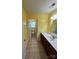 Bathroom with vanity, toilet, and countertop at 8720 Lee St, Mount Pleasant, NC 28124