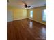 Bedroom with hardwood floors and natural lighting at 8720 Lee St, Mount Pleasant, NC 28124