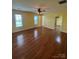 Spacious bedroom with hardwood floors and natural light at 8720 Lee St, Mount Pleasant, NC 28124