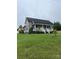 Charming single-Gathering home with a covered front porch and well-manicured lawn at 8720 Lee St, Mount Pleasant, NC 28124