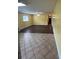 Open-concept living room featuring hardwood floors and natural light at 8720 Lee St, Mount Pleasant, NC 28124