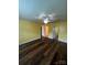 Spacious living room featuring hardwood floors and multiple access points at 8720 Lee St, Mount Pleasant, NC 28124