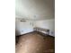 An interior room is shown featuring white walls, a window, and a table, suggesting a space ready for customization at 8720 Lee St, Mount Pleasant, NC 28124