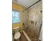 Accessibility shower with grab bars and a bench at 8720 Lee St, Mount Pleasant, NC 28124