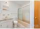 This bathroom features a shower and tub combination and a classic single sink at 925 Rock Grove Church Rd, Salisbury, NC 28146