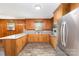 Well-lit kitchen featuring stainless steel appliances and ample cabinetry at 925 Rock Grove Church Rd, Salisbury, NC 28146
