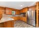 Efficient kitchen boasts stainless appliances, granite countertops and natural light at 925 Rock Grove Church Rd, Salisbury, NC 28146
