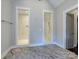 Bathroom featuring separate shower rooms with marble tiling and modern fixtures at 9426 Greyson Ridge Dr, Charlotte, NC 28277