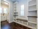 Mudroom features bench seating and shelving at 9426 Greyson Ridge Dr, Charlotte, NC 28277