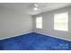 Neutral bedroom with ceiling fan, and natural light at 9900 Colvard Cir, Charlotte, NC 28269