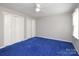 Neutral bedroom with ceiling fan and closet at 9900 Colvard Cir, Charlotte, NC 28269