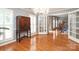 Elegant dining room featuring hardwood floors, a chandelier, and stylish furnishings at 9900 Colvard Cir, Charlotte, NC 28269