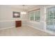 Bright dining area with large window, tiled floor, and natural light at 9900 Colvard Cir, Charlotte, NC 28269