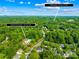 Aerial shot showcases neighborhood amenities near 10908 Delsing Ct, Charlotte, NC in a lush, green setting at 10908 Delsing Ct, Charlotte, NC 28214