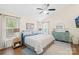 Bright, vaulted ceiling primary bedroom boasts a walk-in closet and ensuite bathroom at 10908 Delsing Ct, Charlotte, NC 28214