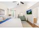Primary bedroom featuring vaulted ceilings, a ceiling fan, and views of the outdoors at 10908 Delsing Ct, Charlotte, NC 28214