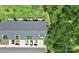 Aerial view of townhomes with rooftop terraces, landscaped lawns, and convenient parking at 11043 Stetler St, Charlotte, NC 28204