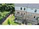 Aerial view of the home featuring a deck, covered patio, and fenced backyard, perfect for outdoor living at 11043 Stetler St, Charlotte, NC 28204