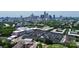 Drone shot of homes with a vibrant city skyline providing a scenic backdrop at 11043 Stetler St, Charlotte, NC 28204