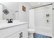 Modern bathroom featuring a shower over tub combination and sleek vanity at 11043 Stetler St, Charlotte, NC 28204