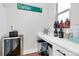 Chic dining area with a wine cooler and white countertop at 11043 Stetler St, Charlotte, NC 28204