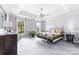 Comfortable bedroom featuring neutral walls, natural light, and plenty of space at 1107 Rachel Anne Dr, Belmont, NC 28012