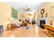 Spacious living room with hardwood floors, fireplace, and abundant natural light at 1107 Rachel Anne Dr, Belmont, NC 28012