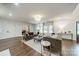 Well-lit living room showcases hardwood floors, elegant furniture, and an open layout at 1121 S Wendover Rd, Charlotte, NC 28211