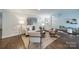 Bright and airy living room featuring neutral colors, comfortable seating, and stylish decor at 1121 S Wendover Rd, Charlotte, NC 28211