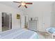 Comfortable bedroom with a ceiling fan and a gray dresser for ample storage at 1155 Rudder Cir, Salisbury, NC 28146
