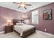 Inviting bedroom with a dark wood bed, complementary nightstands, and warm decor accents at 1155 Rudder Cir, Salisbury, NC 28146