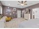 Spacious bedroom with neutral colors, a seating area, and an en-suite bathroom at 1155 Rudder Cir, Salisbury, NC 28146