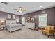 Spacious bedroom with neutral carpet and a comfortable bed, complemented by stylish decor and ample natural light at 1155 Rudder Cir, Salisbury, NC 28146